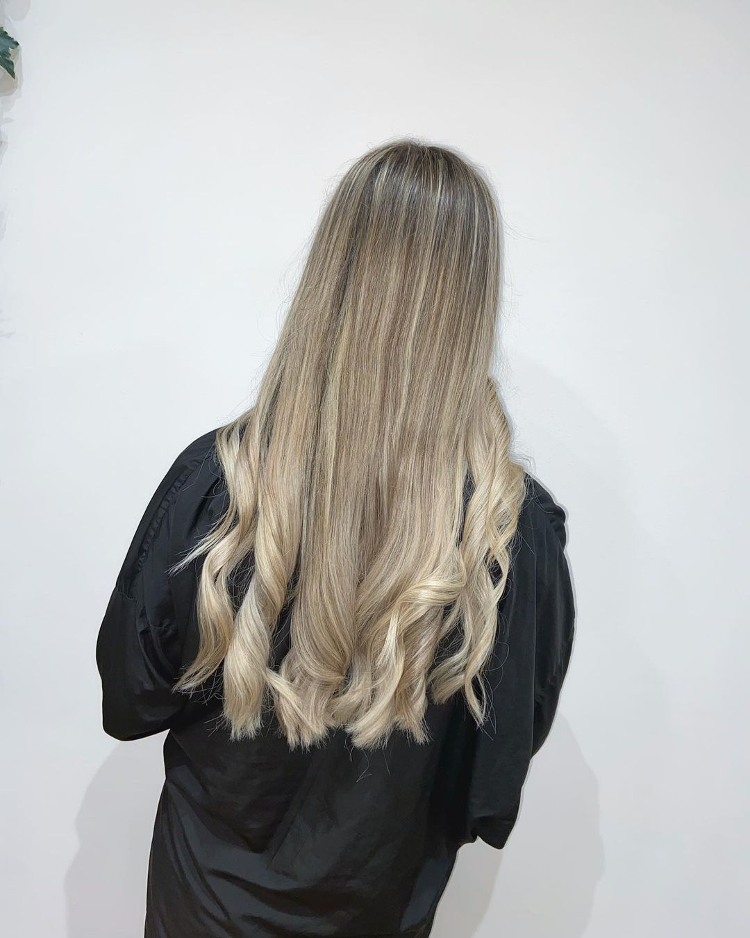 blonde highlights with slightly darker roots at mojo hair salon in Chorley